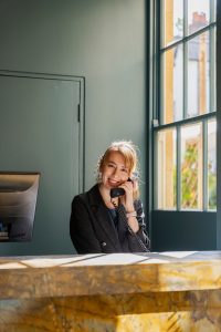 A7R00315 - 2023 - Old Bank Hotel - Oxford - High res - Receptionist Staff Sun - Web Hero